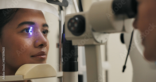 Vision, woman and eye test in clinic, machine and eyecare with optical exam, medical and patient. Technology, office and results with laser, service and treatment in hospital, check up and wellness