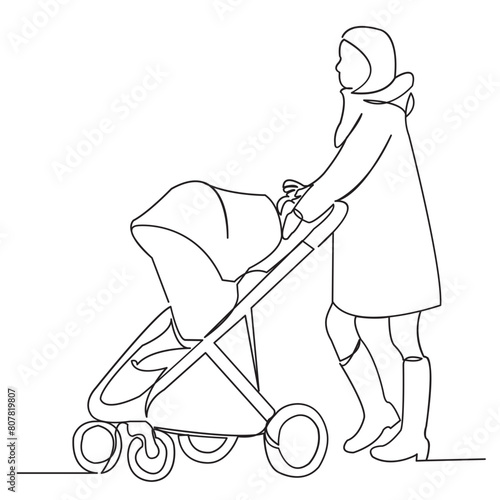 a woman is walking with a stroller