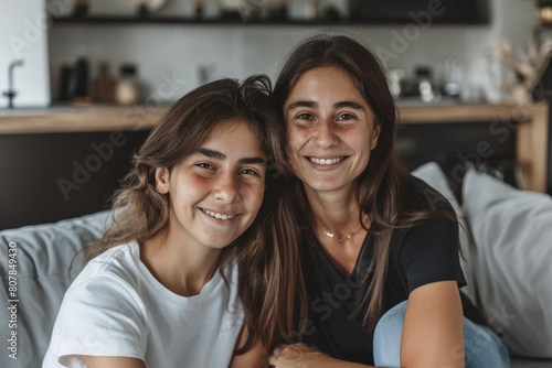 Young girl and her middle-aged mother hug and smile. Beautiful simple AI generated image in 4K, unique.