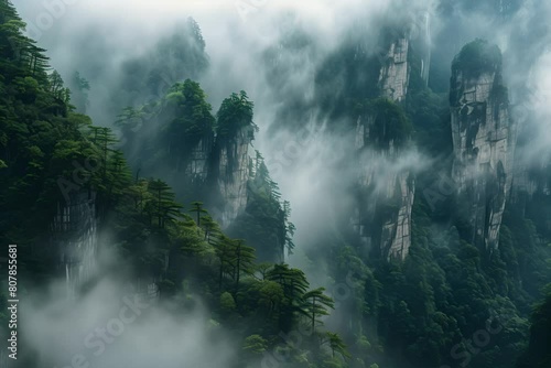 Majestic high rock shapes in fog, exterior view Zhangjiajie/Tianzi, Hunan, China photo
