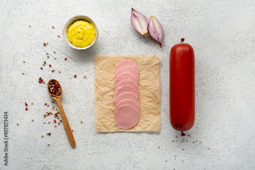 top view sliced ​​milk sausage and mustard