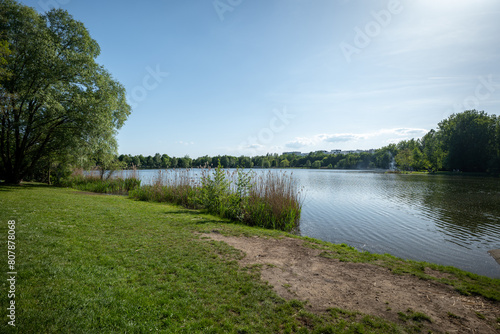 Valley of the Three Ponds in Katowice. Green areas in the city. Recreation zone. Residential buildings in the background