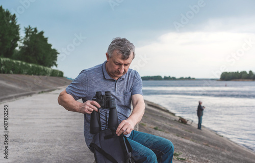 Mature European man with a sad philosophical mood. The concept of life after 50-55 years, problems and depression. Crisis of middle age photo