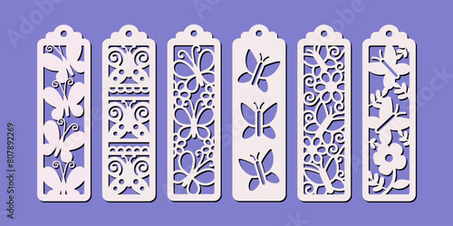 Set of vertical bookmarks with butterfly pattern. Laser cut template. Decorative bookmark stencil for paper, wood and metal cutting. Vector design