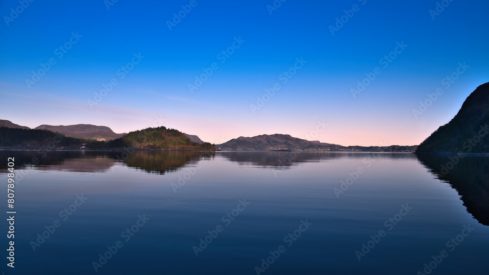 Fjord with view of mountains and fjord landscape in Norway. Landscape in evening