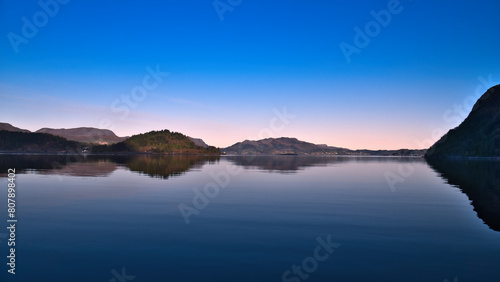 Fjord with view of mountains and fjord landscape in Norway. Landscape in evening