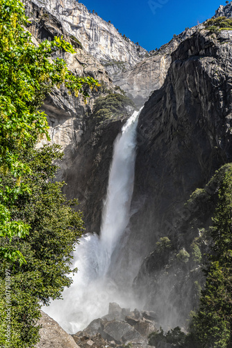 Lower Yosemite Fall. In June 2023, Yosemite Falls was at peak flow due to record snowfall. The thunderous lower fall was photographed from the fall's base in Yosemite Valley.  
