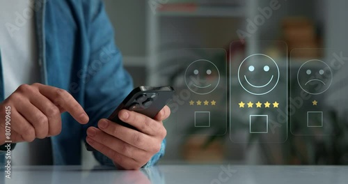 Customer service rating and satisfaction rating concept. Close-up of hands and smartphone, evaluation of the quality of service, store, service, services in the network and social networks. photo
