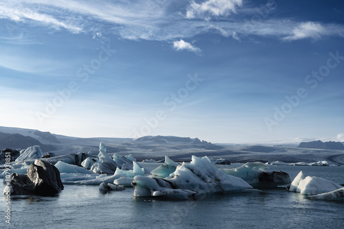 Jökulsárlón Glacier Lagoon. Large glacial lake in southern part of Vatnajökull National Park, Iceland. Breiðamerkurjökull glacier, icebergs move towards the river mouth. Melting ice, global warming.