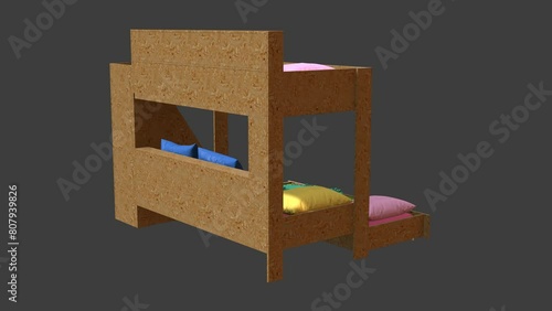 A bunk bed with a blue blanket and pillows on it. The bed is made and has a colorful design photo