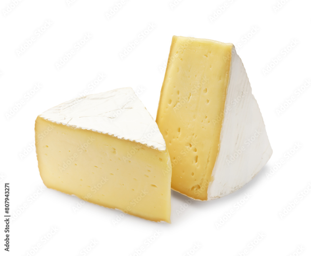Pieces of tasty camembert cheese isolated on white
