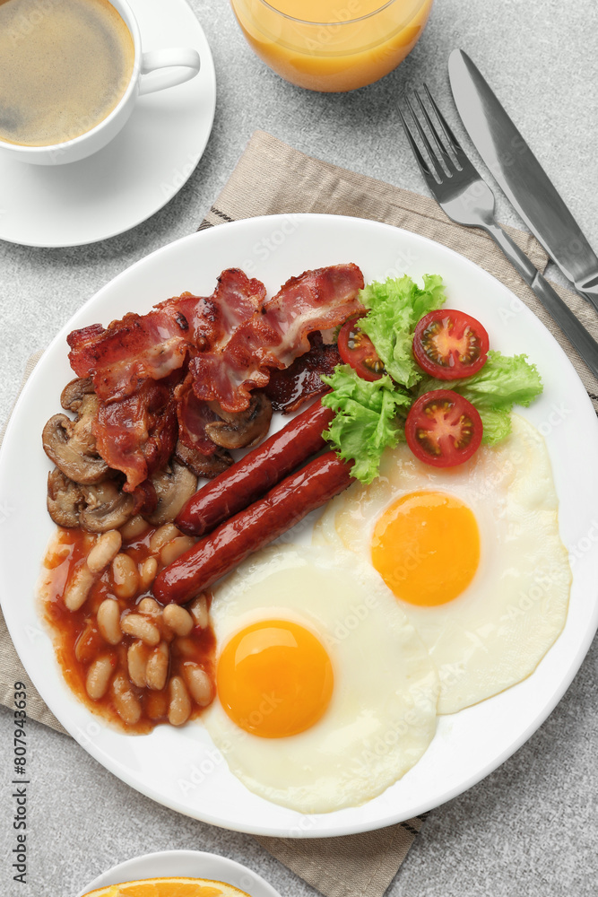 Delicious breakfast with sunny side up eggs on light table, flat lay Delicious breakfast with sunny side up eggs on light table, flat lay