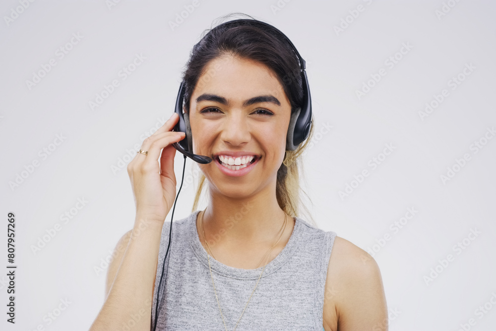 Portrait, woman and sales assistant in studio with smile, headset and happy on white background. Female person, consultant and advisor for support, information and crm with mic for communication Portrait, woman and sales assistant in studio with smile, headset and happy on white background. Female person, consultant and advisor for support, information and crm with mic for communication