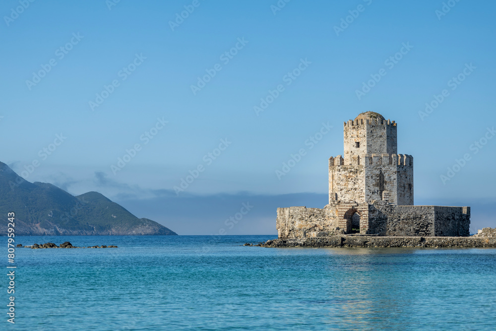 methoni castle in greece with blue clear sea