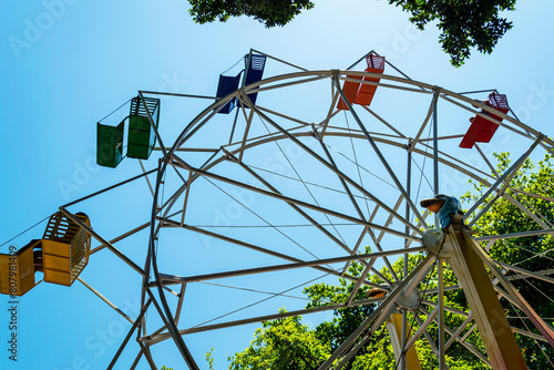 Ferris Wheel toy in the municipal park in Belo Horizonte. Blue sky. Horizontal.