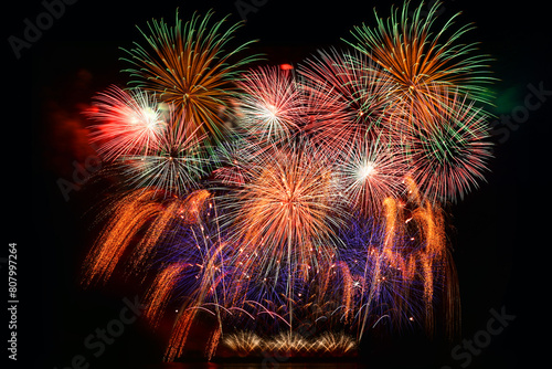 colourful firework display set for celebration happy new year and merry christmas and  fireworks on black background