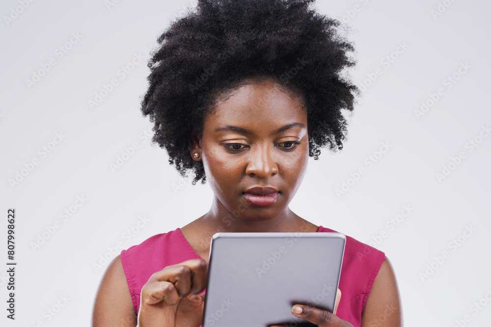 Black woman, tablet and employee in studio, networking and check email or reading notification. Female person, communication and app to chat to business contact, planning and website for research Black woman, tablet and employee in studio, networking and check email or reading notification. Female person, communication and app to chat to business contact, planning and website for research