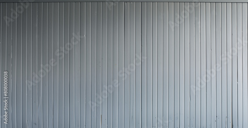 dark grey wall with paneling, beadboard, wall texture, vertical siding
