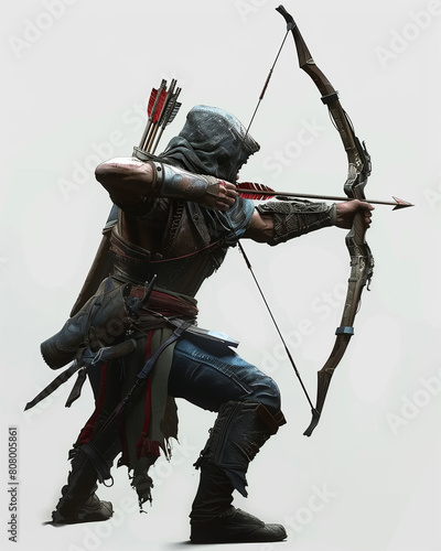 Skilled archer wielding a traditional bow poised for action in a woodland setting. photo