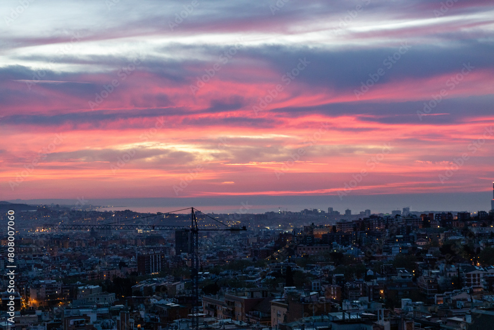 Fototapeta premium dawn, colored sky, morning city, mountains, houses
