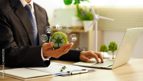 Recycle reduce reuse policy. Green business company with eco-friendly waste management regulation concept. Businessman use a computer to analyze and planning waste recycling for corporation.