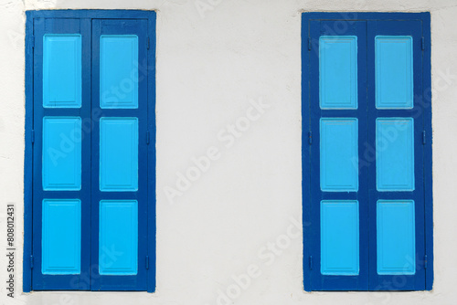 White blue facade of Greek building in Mandraki village on the island of Nisyros. Dodecanese, Greece