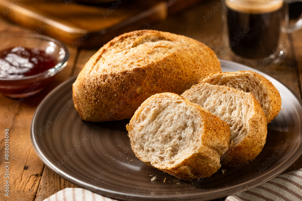 French bread in the basket with butter and rustic background French bread in the basket with butter and rustic background