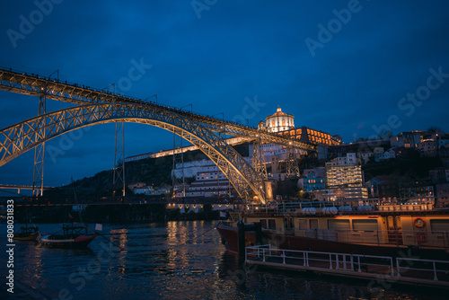 Twilight view of the iconic Don Luis I bridge in Porto, Portugal over the Douro river