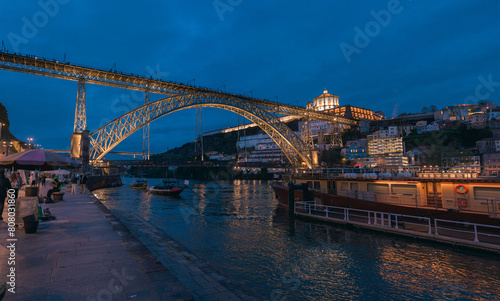 Twilight view of the iconic Don Luis I bridge in Porto, Portugal over the Douro river