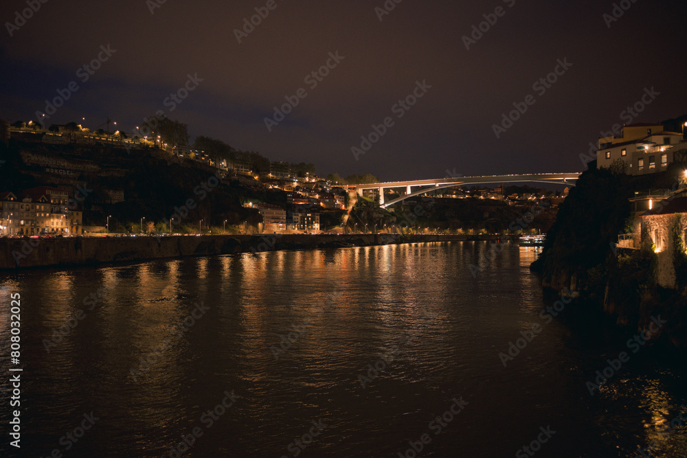 Twilight view of the Douro river and cityscape in Porto, Portugal Twilight view of the Douro river and cityscape in Porto, Portugal