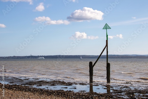 seaside sentry a coastal navigation marker at Browndown Hampshire England with the Isle of Wight in the background © Penny