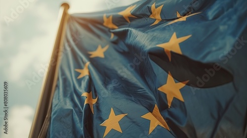 EU Flag Displayed Against Clear Sky, Representation of European Harmony photo