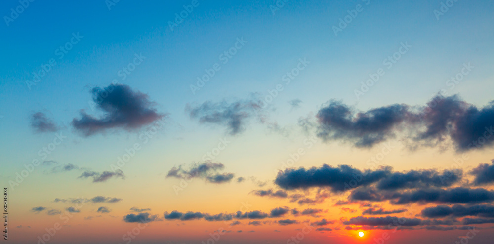 Fototapeta premium Clouds and orange sky,panoramic sunset sky and clouds background