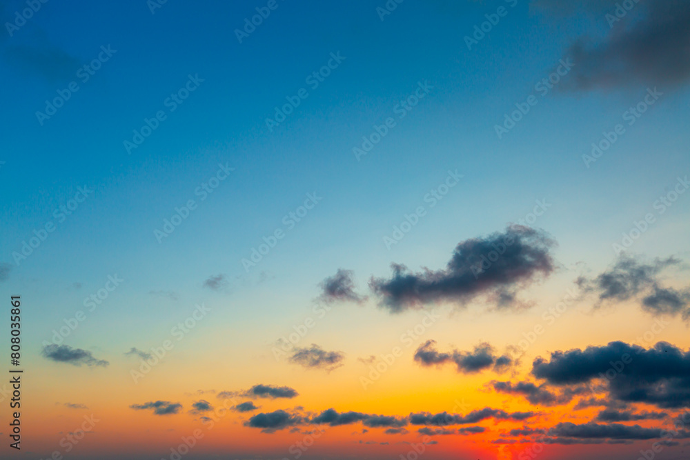 Clouds and orange sky,panoramic sunset sky and clouds background Clouds and orange sky,panoramic sunset sky and clouds background