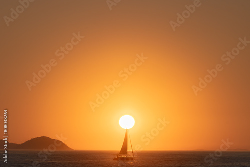 Sunrise at sea with boat