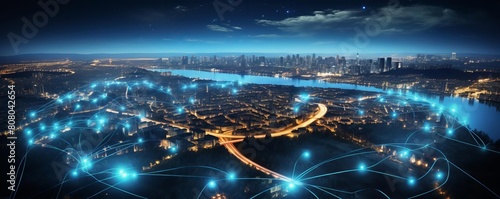 A cityscape with a network of lights that are connected to each other. The lights are blue and they are spread out across the city. Concept of connectivity and interdependence photo