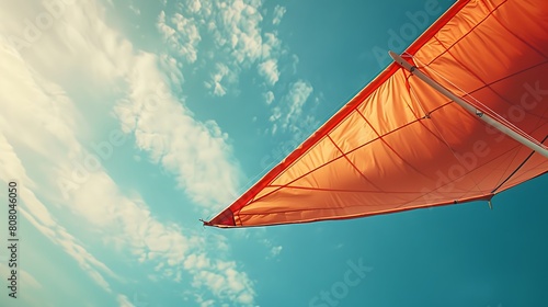 A closeup of Hang Gliding Hang glider  against Sky as background  hyperrealistic sports accessory photography  copy space