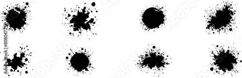 Splashes of ink . Ink drops collection. Black paint splatter .Grunge spot .Spray elements. Liquid blobs and spatters . photo