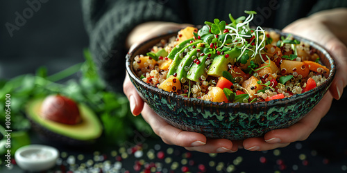 Quinoa Salad Bowl on Dark Background photo