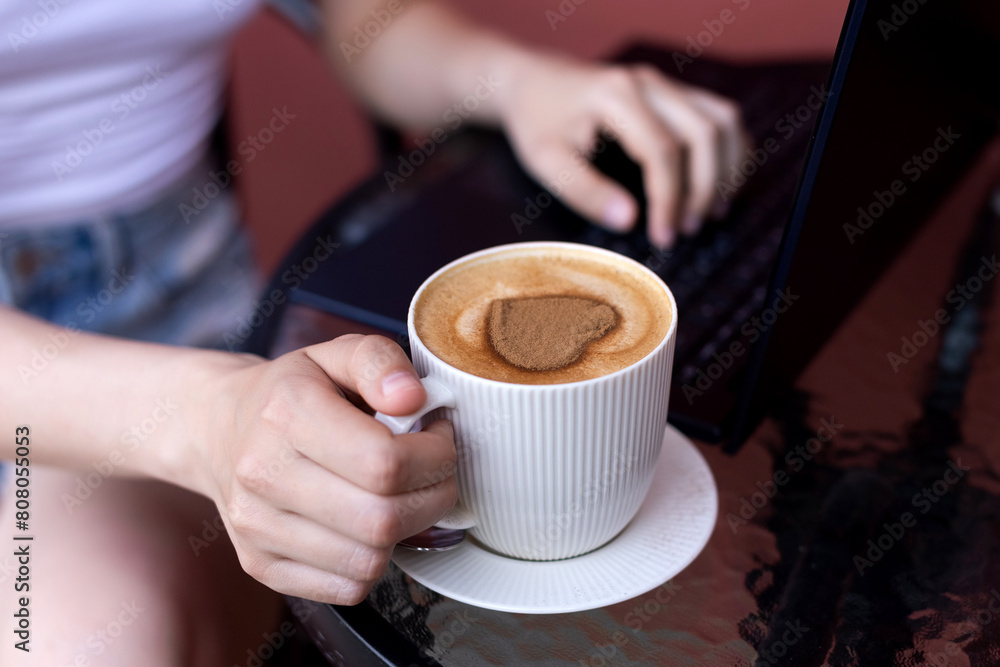 Laptop Work Break with a Heart-Shaped Coffee Foam Laptop Work Break with a Heart-Shaped Coffee Foam