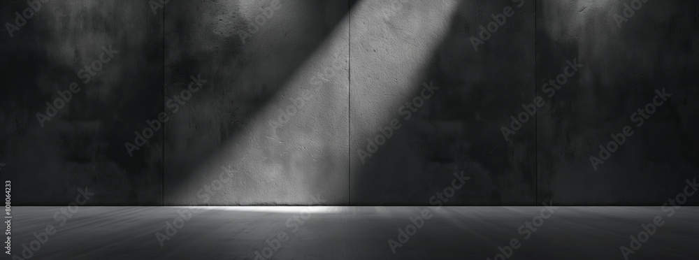 Obraz premium Banner, A dark room with a wall and a light shining on it,Minimalist Illumination: A Dark Room with a Single Light Shining on the Wall, Accentuating Texture and Depth in a Grunge-inspired Space