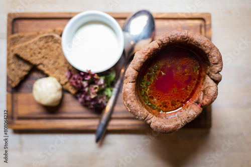 Borsch, traditional ukrainian soup served in bread bowl. Restaurant top view © skumer