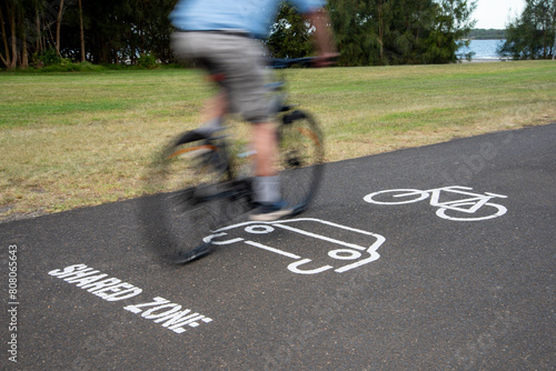 Cycle path shared zone with bike rider photo