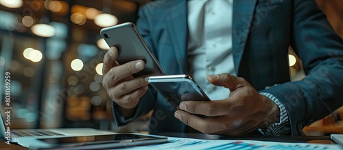An image of a businessman using a smartphone to conduct market research, browsing industry trends and competitor analysis reports