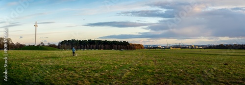 Large panorama of Phoenix Park in Dublin. Cranes in background. photo