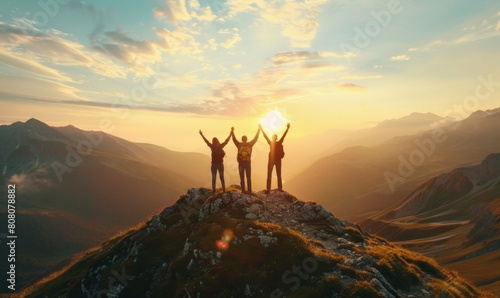 group of friends successfully reached on mountain photo