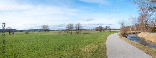 walkway along Jenbach river, view to Auer Weitmoos landscape, near Bad Feilnbach