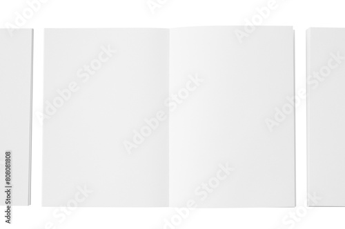 White notebook clipping with three side-by-side spreads