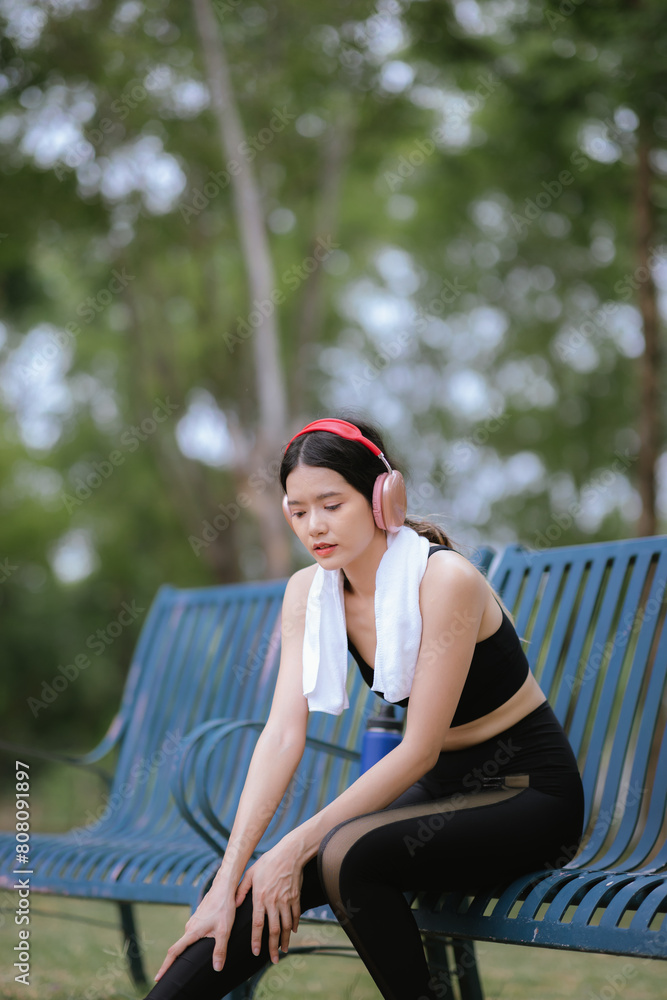 Asian woman exercising in the park Her gaze was determined to lose weight. The concept of healthy lifestyle activities