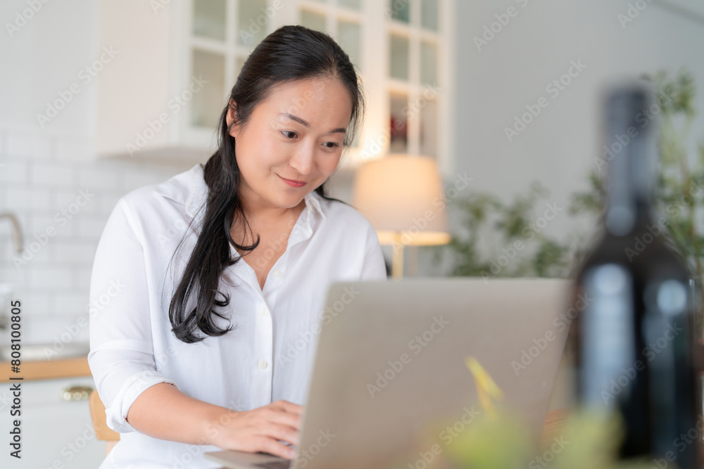 attractive smart asian adult female wear casual cloth working form home using laptop smartphone device,asian female woman work in kitchen island home studio office online hand use smartphone at home attractive smart asian adult female wear casual cloth working form home using laptop smartphone device,asian female woman work in kitchen island home studio office online hand use smartphone at home